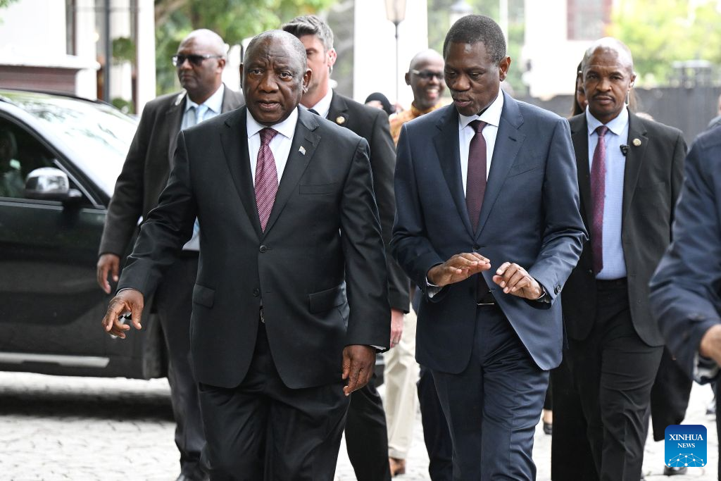 South African President Cyril Ramaphosa (L, front) and Deputy President Paul Mashatile (R, front) arrive at the Parliament to attend the Medium-Term Budget Policy Statement in Cape Town, South Africa, Oct. 21, 2026. South Africa has lowered its economic growth forecast for 2026 to 1.2 percent and announced temporary fuel levy cuts to ease cost-of-living pressures, Finance Minister Enoch Godongwana said on Wednesday. (Photo by Xabiso Mkhabela/Xinhua)