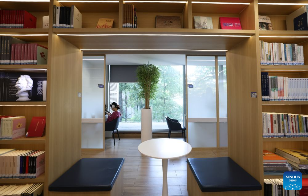 A citizen is pictured at a reading room at Liya community public service center in Nanshan District of Shenzhen, south China's Guangdong Province, Oct. 25, 2026. Shenzhen has been steadily improving the network and functions of its community public service centers since 2015, and has now built more than 4,400 such centers of various types. With each center covering a roughly one-kilometer, 15-minute walking radius, the network delivers all-age-friendly services to local residents, tourists, and foreign visitors.

In recent years, the centers have regularly hosted a rich variety of cultural and recreational activities, and provided amenities including public reading rooms, nursery facilities and community canteens. Receiving over 400,000 visits every day across the network, they function as both convenient public service platforms and venues for community consultation and exchanges, bringing greater warmth to community-level urban governance. (Xinhua/Mao Siqian)
