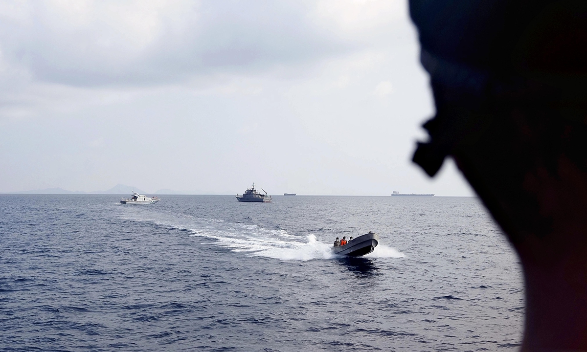 A crude oil tanker passes through the Bab el-Mandeb Strait as a Djibouti Coast Guard vessel conducts a surveillance patrol off Djibouti on September 29, 2026. Photo: VCG