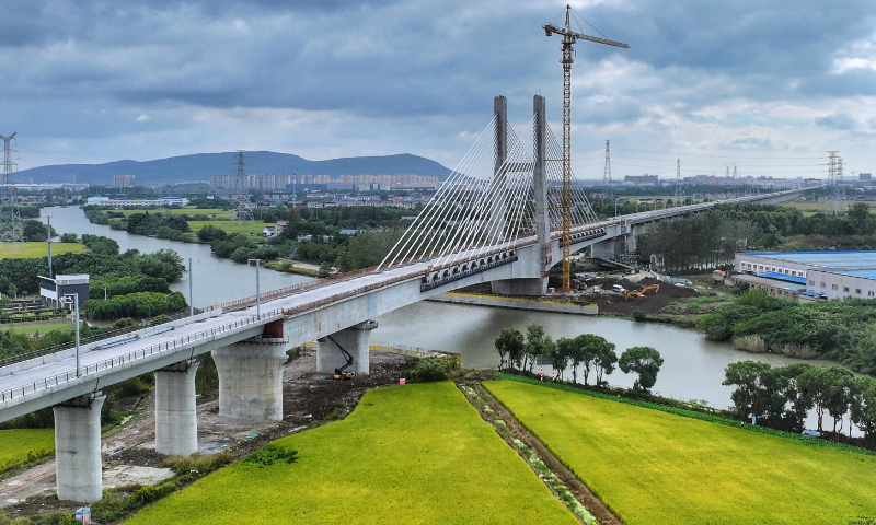 Construction of a bridge on the Nantong-Suzhou-Jiaxing-Ningbo High-Speed Railway is underway in Zhangjiagang, East China's Jiangsu Province, on October 25, 2026. The line forms a key section of China's coastal high-speed railway network linking several cities in Jiangsu and Zhejiang provinces, including Nantong, Suzhou, Jiaxing and Ningbo, with opening planned for 2027. Photo: VCG