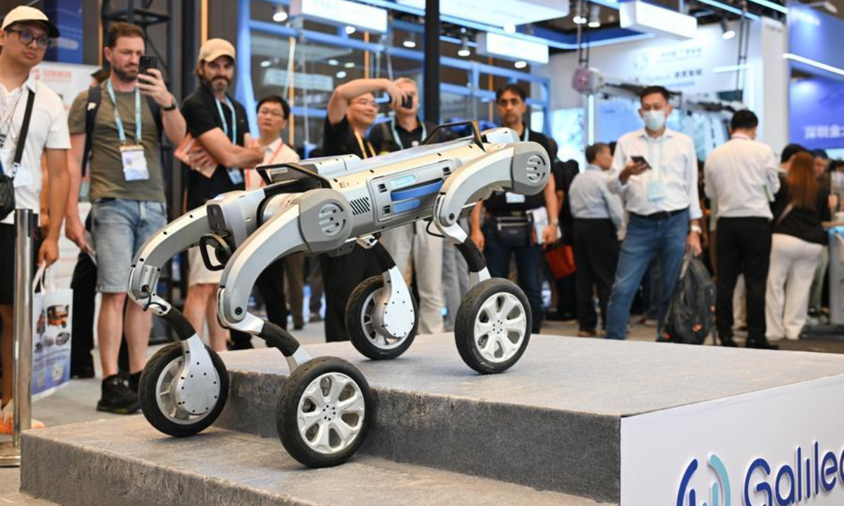 A robot demonstrates stair climbing skills at the 140th China Import and Export Fair, also known as the Canton Fair, in Guangzhou, south China's Guangdong Province, Oct. 15, 2026. (Xinhua/Deng Hua)