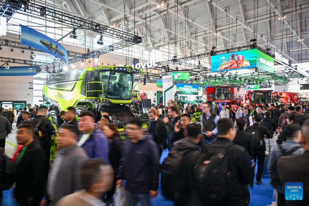 People visit the China International Agricultural Machinery Exhibition (CIAME) 2026 at the National Convention and Exhibition Center (Tianjin) in Tianjin, north China, Oct. 26, 2026. With an area of nearly 300,000 square meters, the three-day exhibition kicked off here on Monday, bringing together over 3,000 enterprises from home and aboard. (Xinhua/Sun Fanyue)