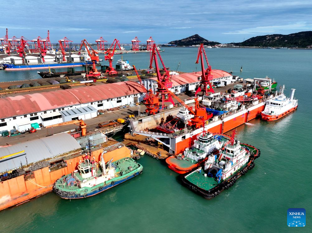 A drone photo taken on Oct. 19, 2026 shows vessels under construction at a base in Lianyungang, east China's Jiangsu Province. Robust growth in the electronics industry and high-tech manufacturing helped drive a double-digit increase in the profits of China's major industrial firms during the first nine months of 2026, official data showed Tuesday. Profits of major industrial firms rose 15.5 percent year on year to 6.03 trillion yuan (about 897.7 billion U.S. dollars) during the January-September period, maintaining double-digit growth since the beginning of the year, according to the National Bureau of Statistics (NBS). (Photo by Wang Chun/Xinhua)
