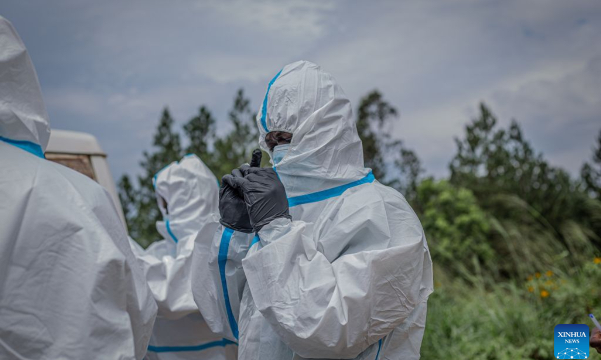 Medical workers put on protective suits in Rwampara, Ituri Province in the Democratic Republic of the Congo, Oct. 27, 2026. Ebola cases in the Democratic Republic of the Congo (DRC) have surpassed 10,000, marking a grim milestone in what has become the world's second-largest recorded Ebola outbreak.

The latest figures released Tuesday by the country's health authorities showed that the country had recorded a total of 10,060 confirmed cases, including 4,887 deaths, as of Oct. 25, with the fatality rate at 48.6 percent. (Str/Xinhua)