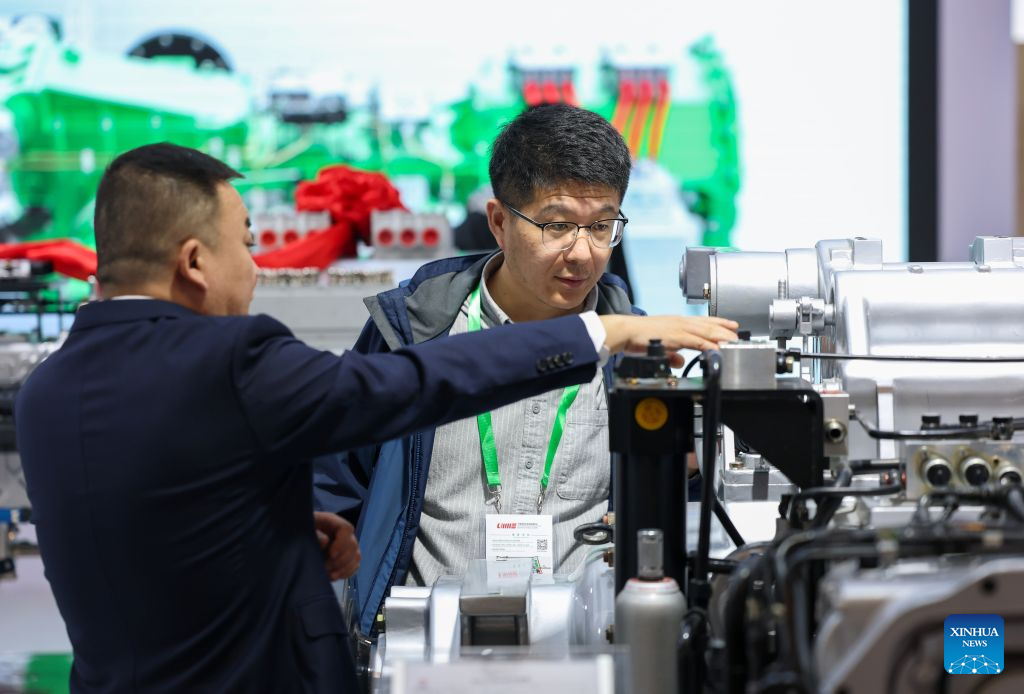 A visitor looks at a product during the China International Agricultural Machinery Exhibition (CIAME) 2026 at the National Convention and Exhibition Center (Tianjin) in Tianjin, north China, Oct. 26, 2026. With an area of nearly 300,000 square meters, the three-day exhibition kicked off here on Monday, bringing together over 3,000 enterprises from home and aboard. (Xinhua/Sun Fanyue)