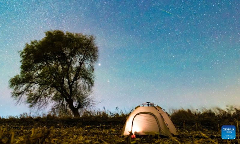 This photo taken on Oct. 22, 2026 shows the Orionid meteor shower in the sky over Fujin City, northeast China's Heilongjiang Province. The Orionid meteor shower, caused by remnants from Halley's comet, peaked on Wednesday and Thursday. Photo: Xinhua