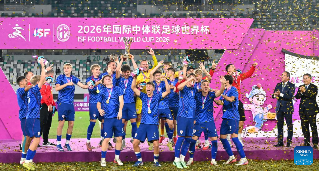 Men's group winner members of Croatia celebrate during the awarding ceremony at the 2026 International School Sport Federation (ISF) Football World Cup in Suzhou, east China's Jiangsu Province, Oct. 25, 2026. (Photo by Yang Suping/Xinhua)