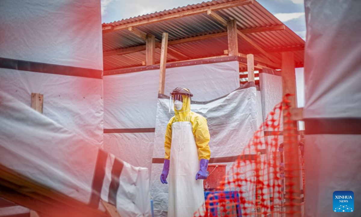 A medical worker patrols at an Ebola treatment center in Bunia, capital of Ituri Province in the Democratic Republic of the Congo (DRC), on Oct. 18, 2026.

The Africa Centers for Disease Control and Prevention (Africa CDC) has called for greater global solidarity and international support to contain the rapidly expanding Bundibugyo Ebola outbreak. (Xinhua)