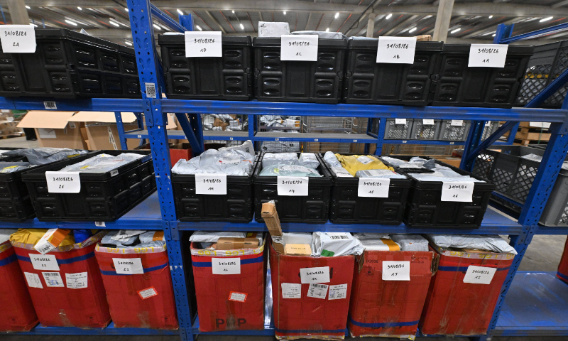 Photo taken on September 3, 2026 shows e-commerce parcels stored at a warehouse near Liege Airport in Grace-Hollogne, Belgium. Photo: VCG