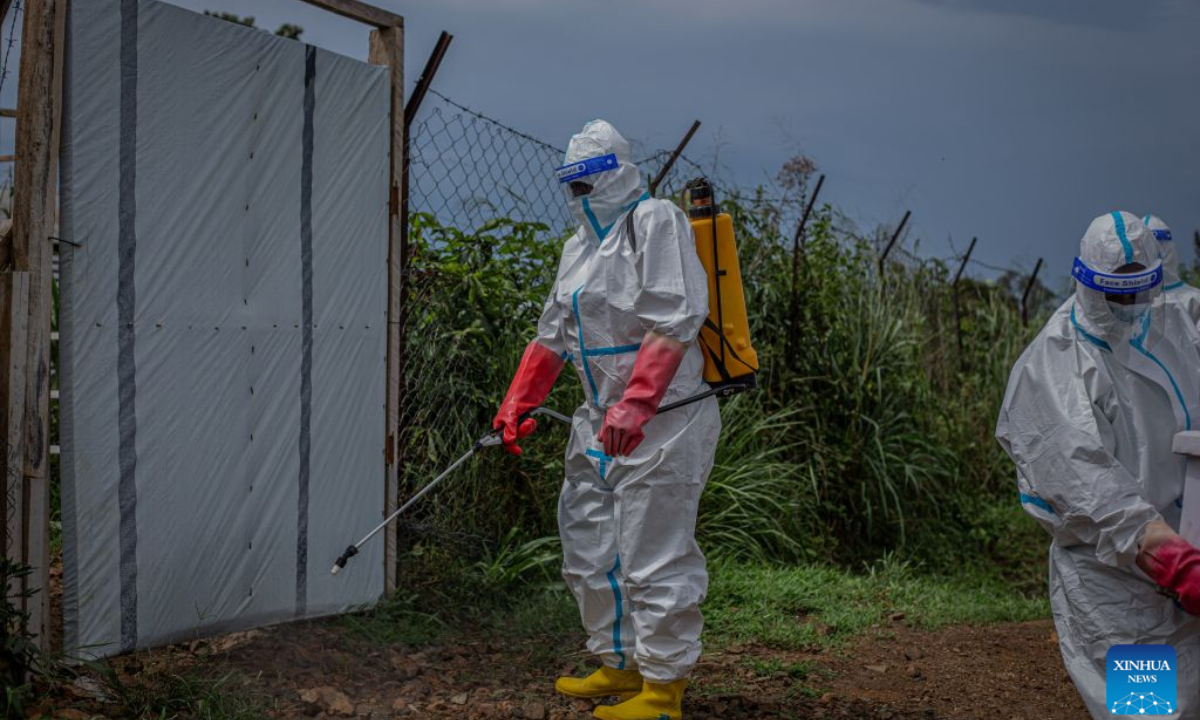 A medical worker conducts disinfection in Rwampara, Ituri Province in the Democratic Republic of the Congo, Oct. 27, 2026. Ebola cases in the Democratic Republic of the Congo (DRC) have surpassed 10,000, marking a grim milestone in what has become the world's second-largest recorded Ebola outbreak. The latest figures released Tuesday by the country's health authorities showed that the country had recorded a total of 10,060 confirmed cases, including 4,887 deaths, as of Oct. 25, with the fatality rate at 48.6 percent. (Str/Xinhua)