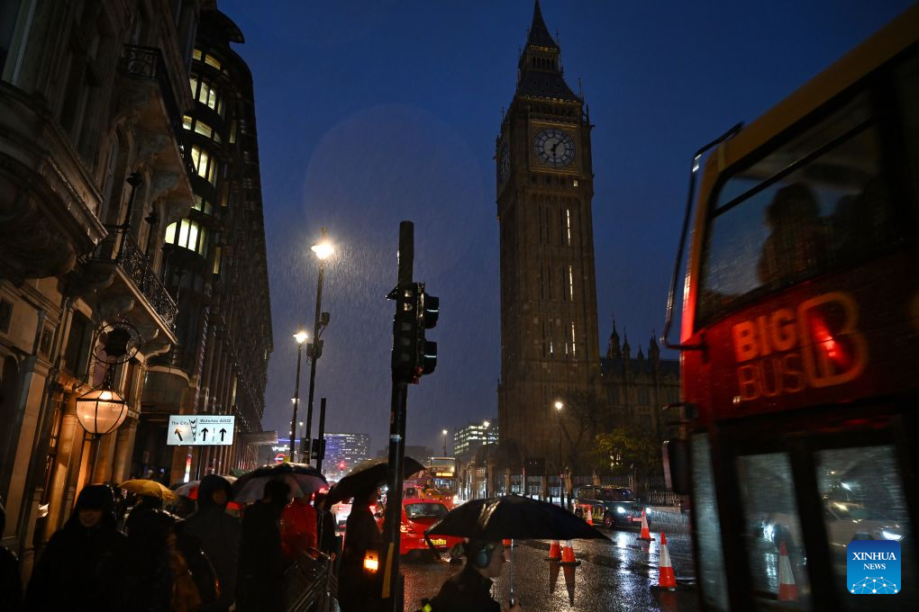 This photo taken on the evening of Oct. 24, 2026 shows the Elizabeth Tower, commonly known as Big Ben, with its clock faces unlit for maintenance and time adjustments ahead of Britain's return to Greenwich Mean Time (GMT) in London, Britain. Britain ended British Summer Time (BST) at 2am on Sunday, October 25, 2026, setting clocks back one hour to Greenwich Mean Time (GMT). (Xinhua/Li Mangmang)