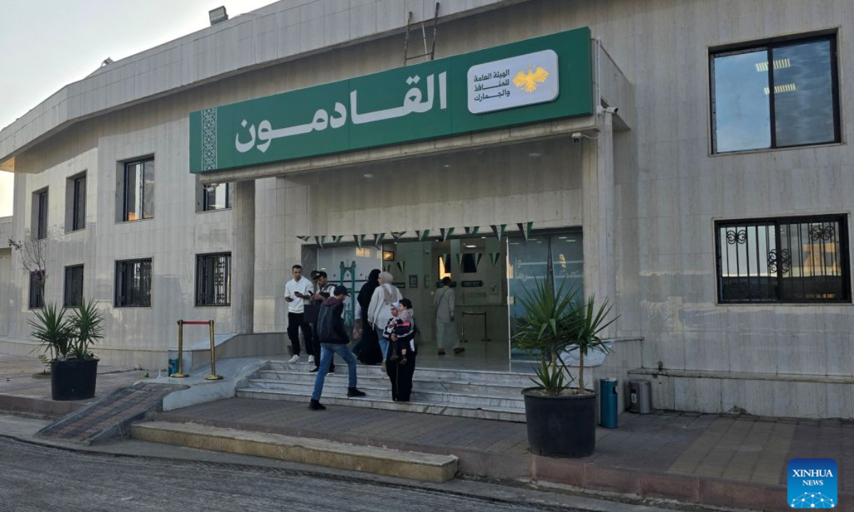 Travelers enter a passenger terminal at the Nasib border crossing between Syria and Jordan in Daraa province, southern Syria, Oct. 28, 2026. Syria and Jordan have agreed to establish a joint security committee to investigate recent Jordanian airstrikes on southern Syria, as the Nasib border crossing between the two countries reopened Wednesday following a temporary closure, Syrian state media reported. (Str/Xinhua)