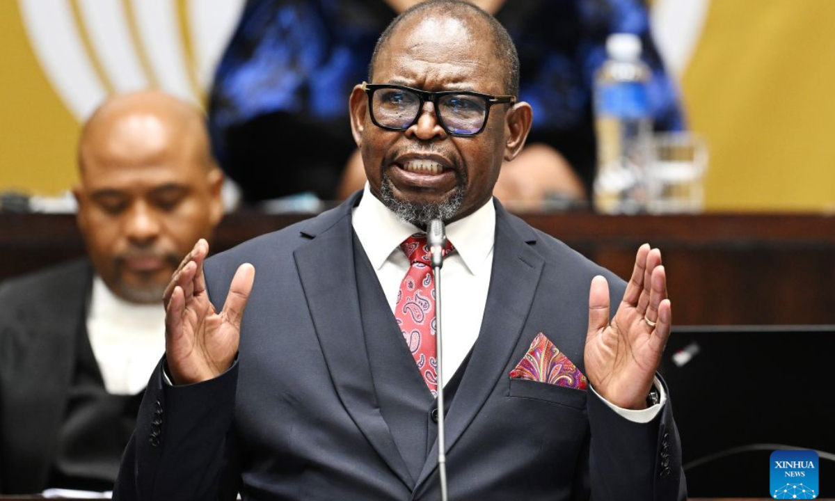 South African Finance Minister Enoch Godongwana delivers the Medium-Term Budget Policy Statement in Parliament in Cape Town, South Africa, Oct. 21, 2026. South Africa has lowered its economic growth forecast for 2026 to 1.2 percent and announced temporary fuel levy cuts to ease cost-of-living pressures, Finance Minister Enoch Godongwana said on Wednesday.(Photo by Xabiso Mkhabela/Xinhua)