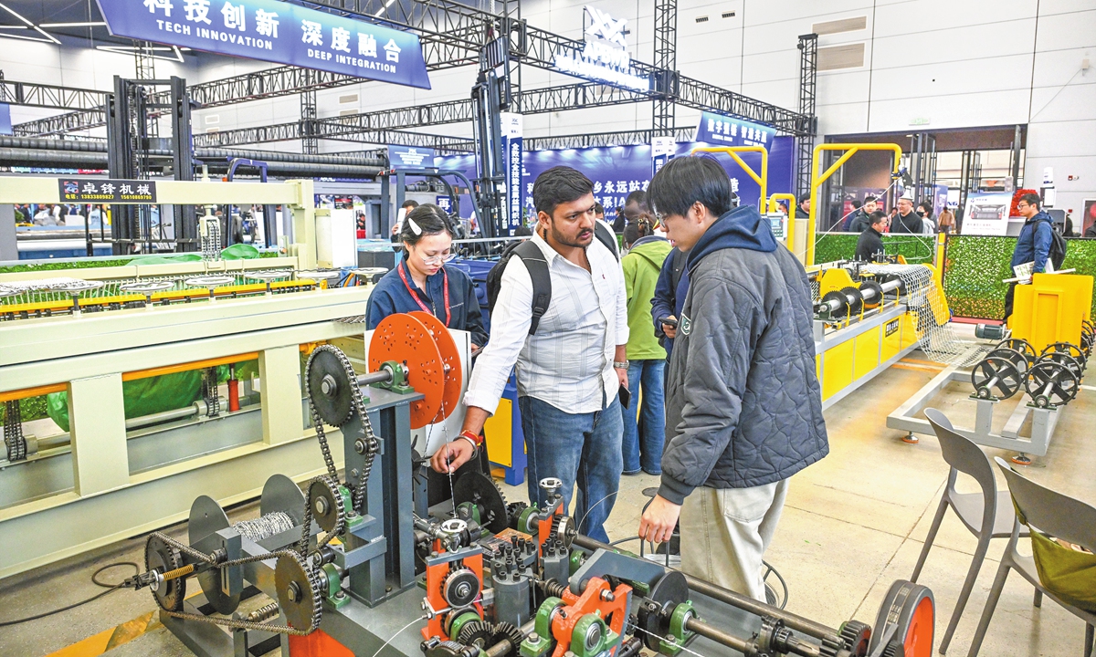 Exhibitors introduce products to overseas buyers at the 2026 China Anping International Wire Mesh Fair in Anping county, Hengshui, North China's Hebei Province, on October 22, 2026. The region exports wire mesh products to markets worldwide and is a major production hub and distribution center for these products in China. Photo: CNS Photo