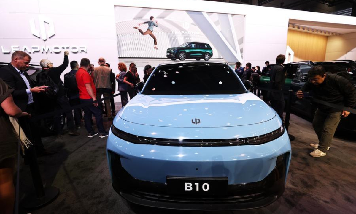People visit the pavilion of Chinese carmaker Leapmotor at the 2024 Paris Motor Show during the media day in Paris, France, Oct. 14, 2024. (Xinhua/Gao Jing)
