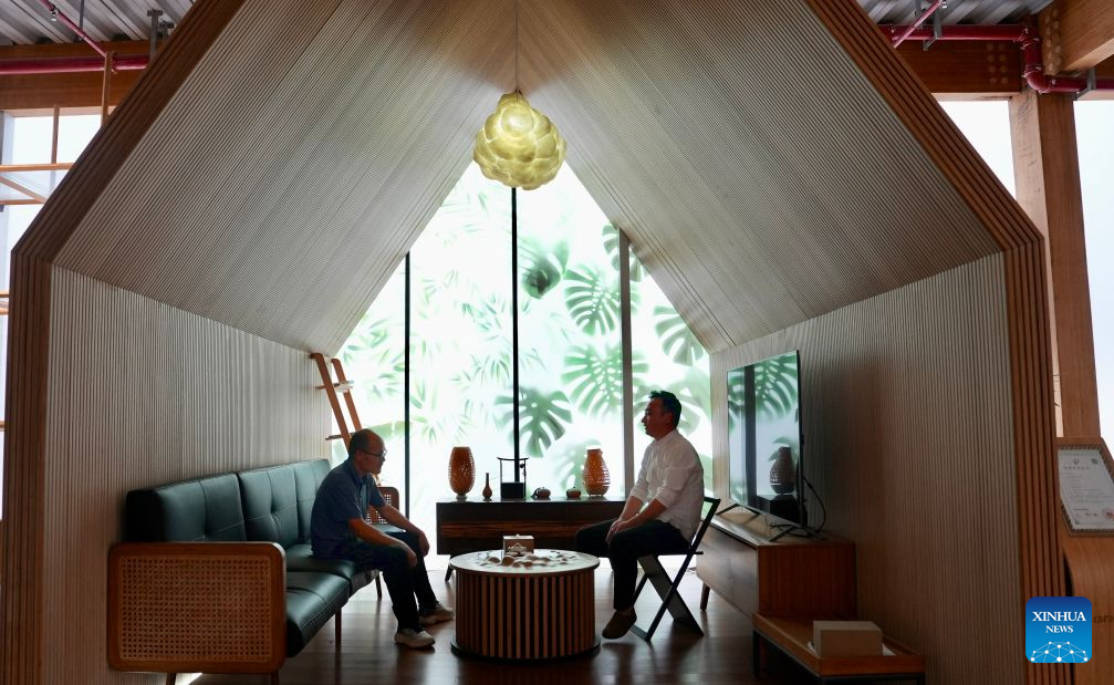 Customers experience a living room made of bamboo at a bamboo company in Shangyou County, east China's Jiangxi Province, Oct. 26, 2026. Shangyou County in east China's Jiangxi is a major bamboo-producing area. In recent years, its industrial chain has expanded into high-value-added fields such as bamboo building, bamboo fiber, and bamboo charcoal.
As of December 2025, the county's bamboo industry had a total output value of 883 million yuan (about 131.5 million U.S. dollars), with products exported to over 30 countries and regions. (Xinhua/Hu Chenhuan)