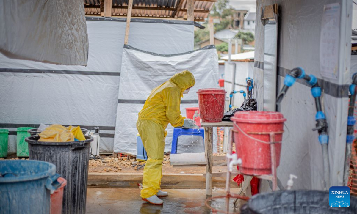 A medical worker disinfects hands at an Ebola treatment center in Bunia, capital of Ituri Province in the Democratic Republic of the Congo (DRC), on Oct. 18, 2026.

The Africa Centers for Disease Control and Prevention (Africa CDC) has called for greater global solidarity and international support to contain the rapidly expanding Bundibugyo Ebola outbreak. (Xinhua)