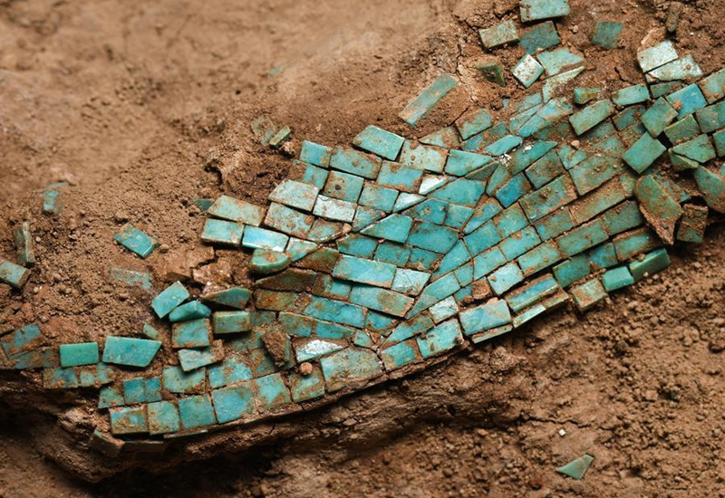 This photo taken on Jan. 29, 2024 shows the details of a turquoise dragon-form artifact at Chinese Archaeological Museum in Beijing, capital of China. (Xinhua/Li He)