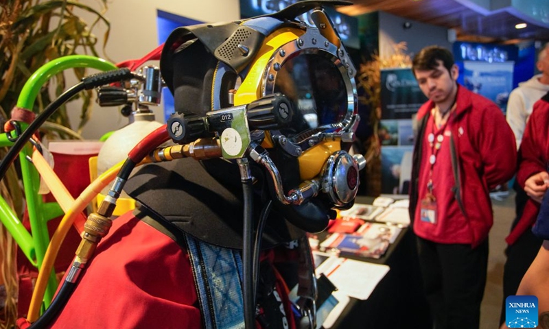 Diving equipment is displayed during Divers' Weekend at the Vancouver Aquarium in Vancouver, British Columbia, Canada, on Oct. 24, 2026. The two-day event, which opened here on Saturday, brings together diving professionals and organizations and features diving equipment displays, underwater demonstrations and expert talks aimed at promoting diving safety and preparedness. (Photo by Liang Sen/Xinhua)
