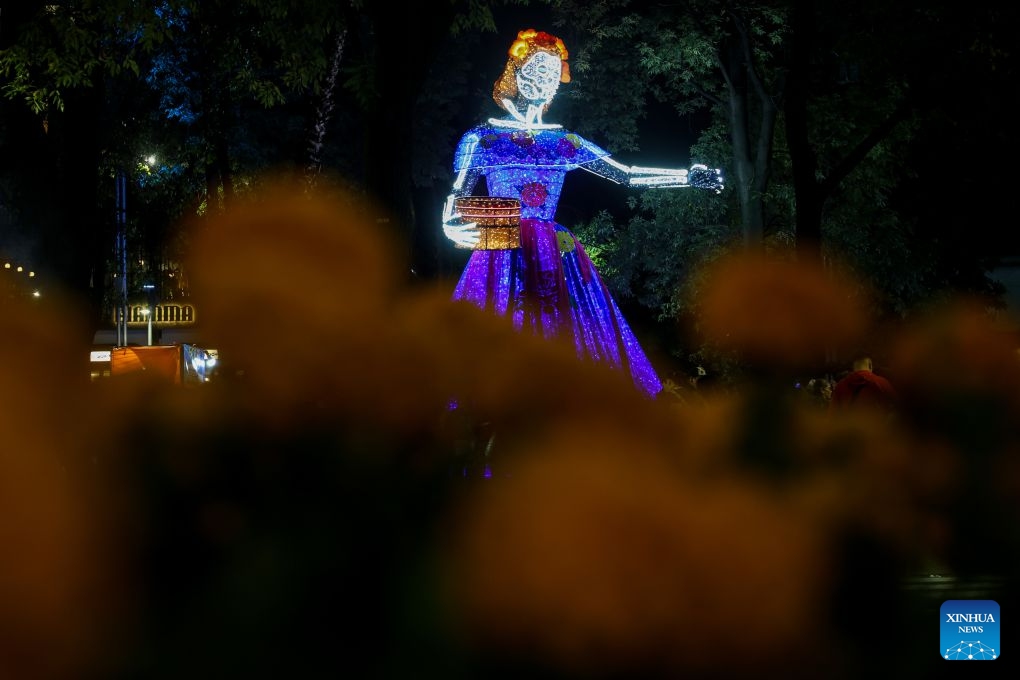 This photo taken on Oct. 23, 2026 shows a Catrina-shaped light art installation along Paseo de la Reforma in Mexico City, capital of Mexico. As the Day of the Dead approaches, giant light sculptures along Paseo de la Reforma in Mexico City, capital of Mexico, are illuminated. (Photo by Francisco Canedo/Xinhua)