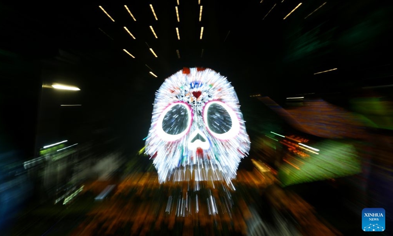 This photo taken on Oct. 23, 2026 shows a skull-shaped light art installation along Paseo de la Reforma in Mexico City, capital of Mexico. As the Day of the Dead approaches, giant light sculptures along Paseo de la Reforma in Mexico City, capital of Mexico, are illuminated. (Photo by Francisco Canedo/Xinhua)