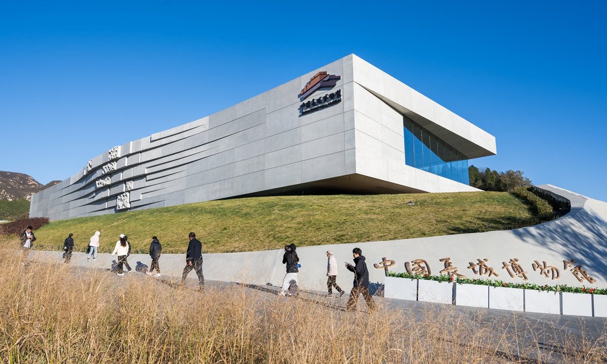 Visitors walk outside the China Great Wall Museum on October 24, 2026. Photos on this page: Chen Tao/Global Times  From left: Models of a Great Wall gate tower, watchtower and beacon tower on display