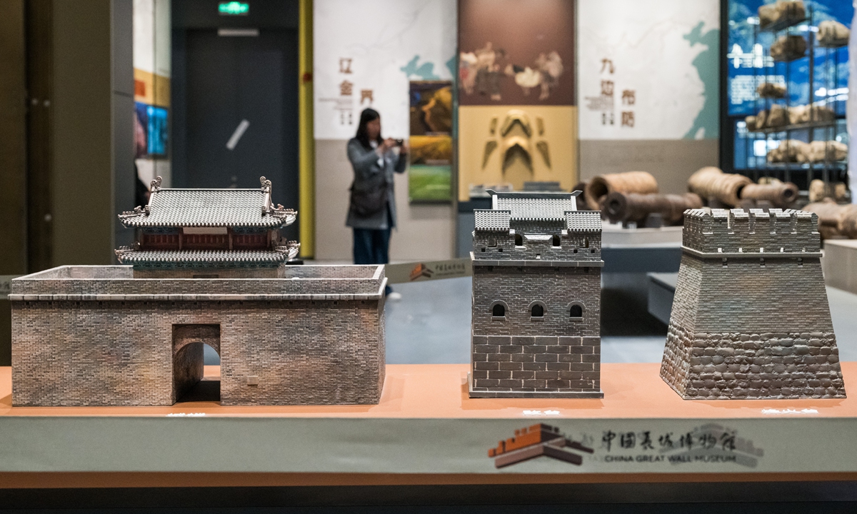 Visitors walk outside the China Great Wall Museum on October 24, 2026. Photos on this page: Chen Tao/Global Times  From left: Models of a Great Wall gate tower, watchtower and beacon tower on display