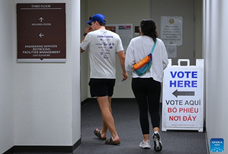People enter a polling station after early voting for the Nov. 3 U.S. midterm elections started, in Fort Worth, Texas, the United States, on Oct. 23, 2026. (Xinhua/Li Rui)