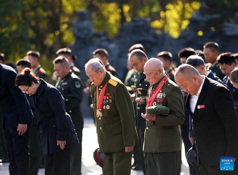 Representatives from all walks of life observe a moment of silence during a commemorative activity, marking the 76th anniversary of the Chinese People's Volunteers' (CPV) entering the Democratic People's Republic of Korea to fight in the War to Resist U.S. Aggression and Aid Korea, at the CPV martyrs' cemetery in Shenyang, northeast China's Liaoning Province, Oct. 25, 2026. The event was held here on Sunday. (Xinhua/Li Gang)