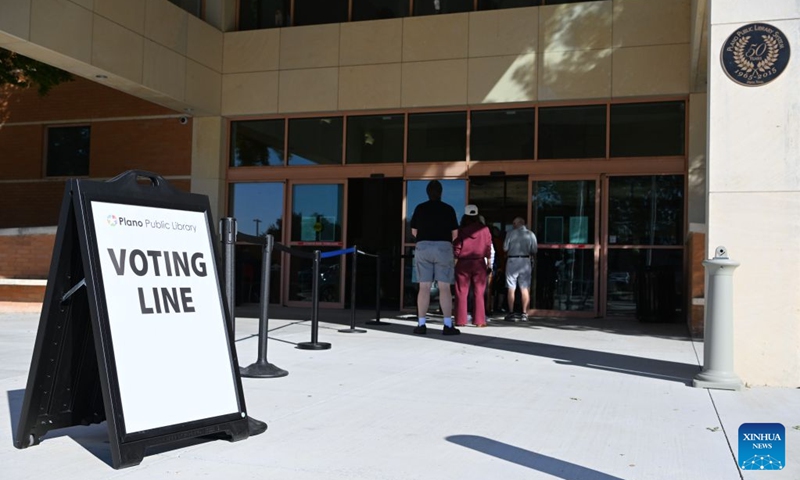 People line up to enter a polling station after early voting for the Nov. 3 U.S. midterm elections started, in Plano, Texas, the United States, on Oct. 24, 2026. (Xinhua/Li Rui)