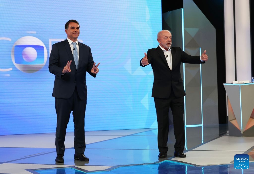 Brazilian President Luiz Inacio Lula da Silva (R), presidential candidate of Brazil's ruling Workers' Party, attends a televised debate with Brazilian Senator Flavio Bolsonaro, presidential candidate of Brazil's Liberal Party, in Rio de Janeiro, Brazil, Oct. 23, 2026. 