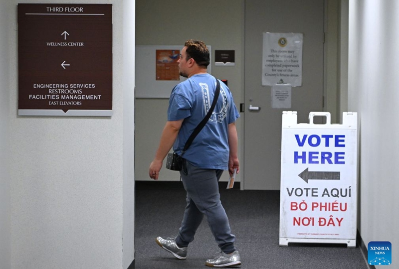 A man enters a polling station after early voting for the Nov. 3 U.S. midterm elections started, in Fort Worth, Texas, the United States, on Oct. 23, 2026. (Xinhua/Li Rui)
