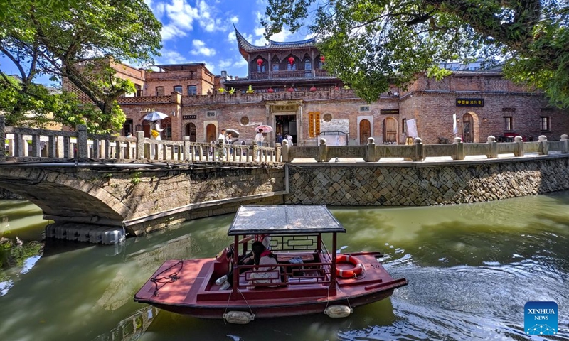 Tourists take a boat to enjoy the scenery at the Shangxiahang traditional block in Fuzhou, southeast China's Fujian Province, Oct. 23, 2026. Fuzhou, located on the coast of the East China Sea and the banks of the Minjiang River, is a renowned historical city with a history of over 2,200 years. Relying on its natural endowments and cultural heritage, Fuzhou has coordinated urban renewal, ecological governance, cultural heritage preservation and other aspects to promote high-quality and sustainable urban development. (Xinhua/Wei Peiquan)