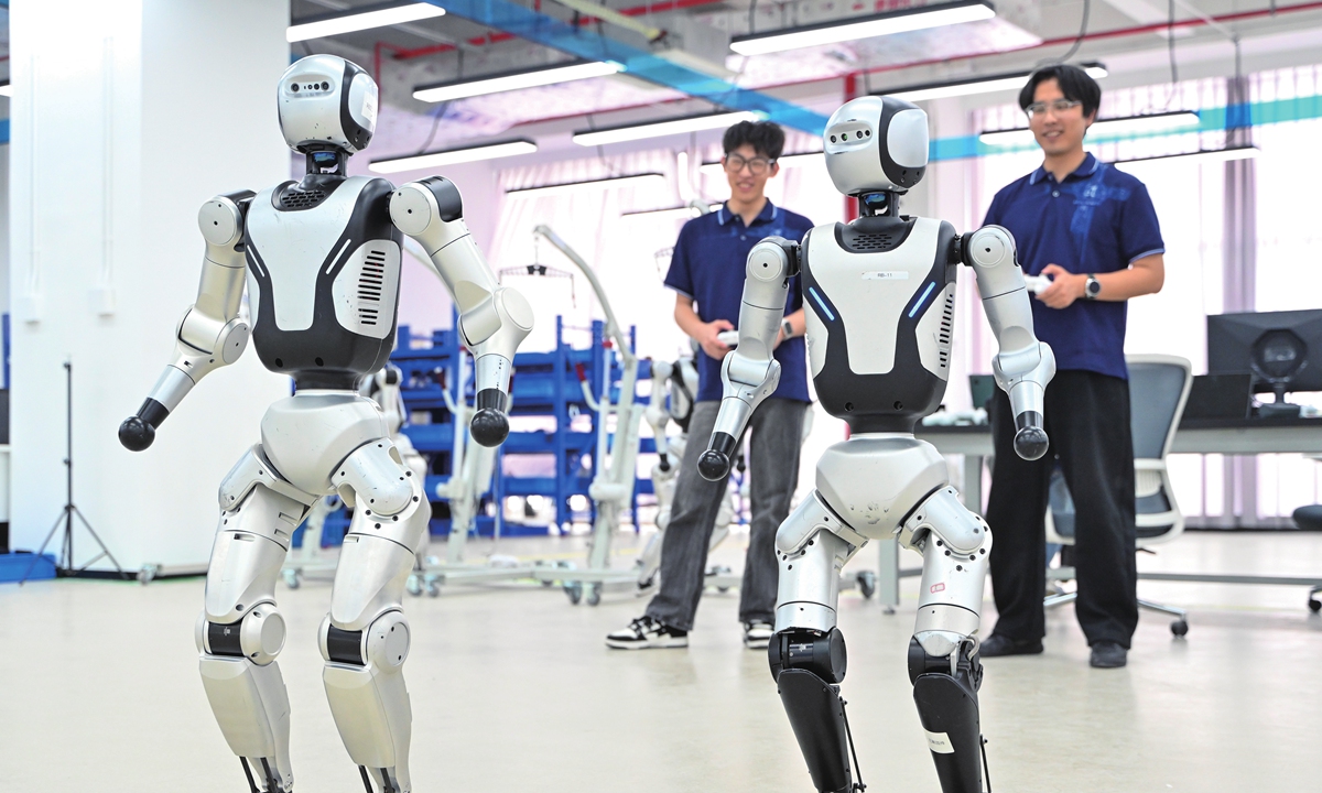 Humanoid robots undergo testing and debugging at Shenzhen's first humanoid robot pilot production line in South China's Guangdong Province on April 12, 2026. Photo: VCG
