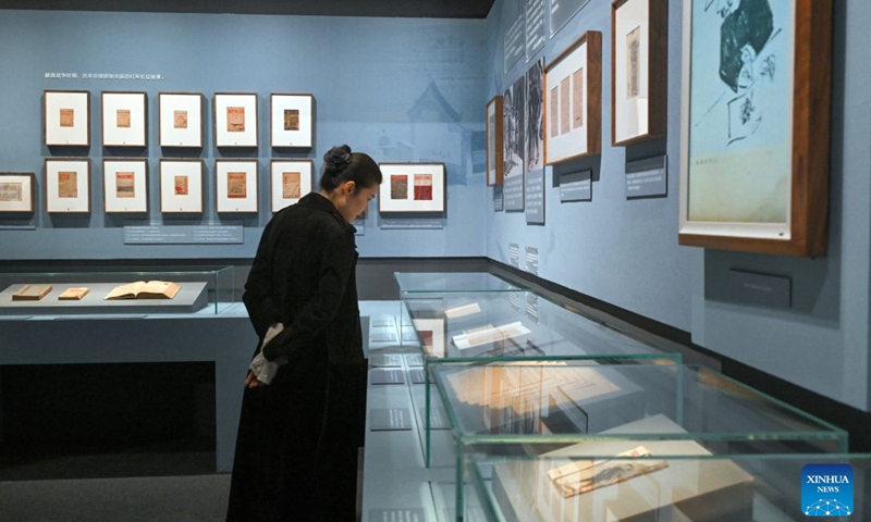 A visitor looks at an exhibit during Heroes Remembered, Generations Inspired, a joint exhibition on revolutionary artifacts commemorating the 90th anniversary of the victory of the Chinese Workers' and Peasants' Red Army's Long March, at the National Museum of China in Beijing, capital of China, Oct. 30, 2026. The joint exhibition opened here on Friday. It features over 400 exhibits, showcasing the epic journey of the Red Army through blockades and across thousands of miles. (Xinhua/Jin Liangkuai)