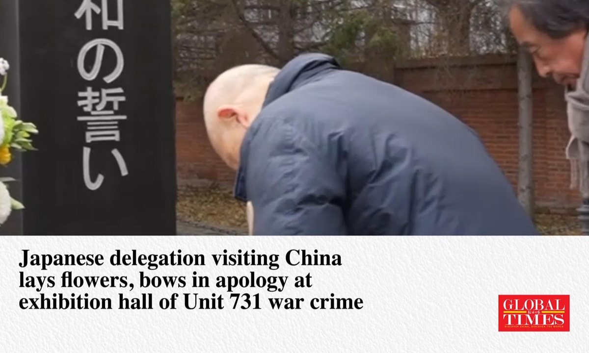 Japanese delegation visiting China lays flowers, bows in apology at exhibition hall of Unit 731 war crime
