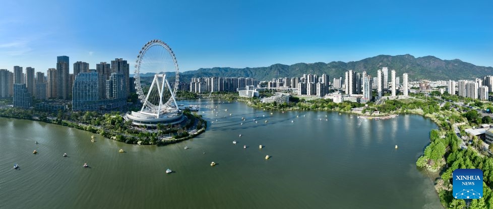 A panoramic drone photo taken on May 1, 2026 shows a view in the Jin'an Lake Park in Fuzhou, southeast China's Fujian Province. Fuzhou, located on the coast of the East China Sea and the banks of the Minjiang River, is a renowned historical city with a history of over 2,200 years. Relying on its natural endowments and cultural heritage, Fuzhou has coordinated urban renewal, ecological governance, cultural heritage preservation and other aspects to promote high-quality and sustainable urban development. (Xinhua/Jiang Kehong)