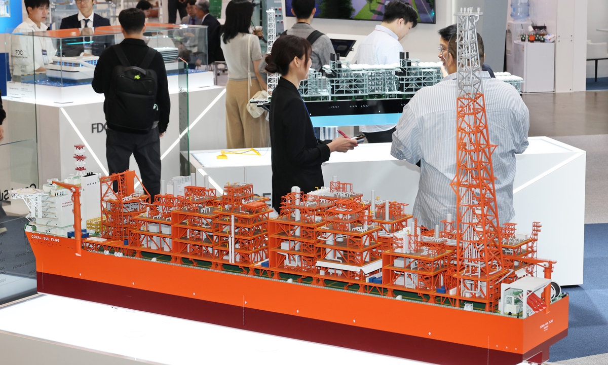 Visitors check out ship models at a booth during the Offshore Korea 2026 held in Busan, South Korea on October 14, 2026. Photo: VCG